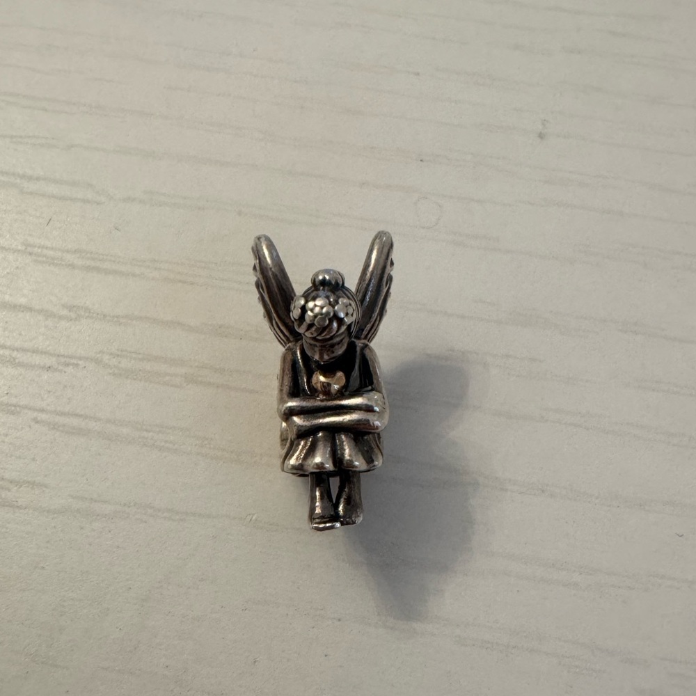 Pandora two toned 14k retired angel charm